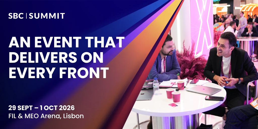 Two SBC Summit attendees in conversation at a networking table, with the headline "An Event That Delivers on Every Front" and event dates 29 September–1 October 2026 at FIL & MEO Arena, Lisbon.
